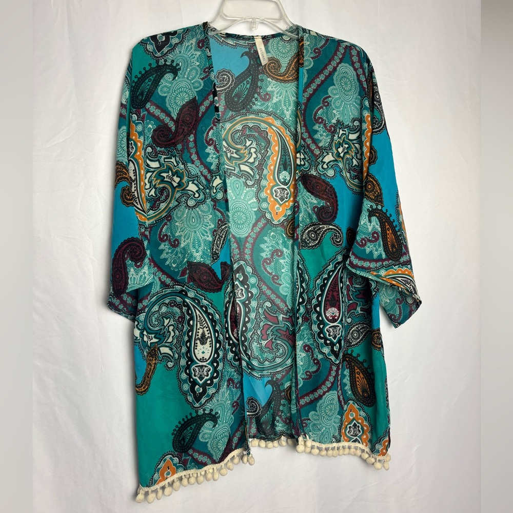 Cezanne 
paisley print kimono cardigan  worn as a summer beach cover-up.